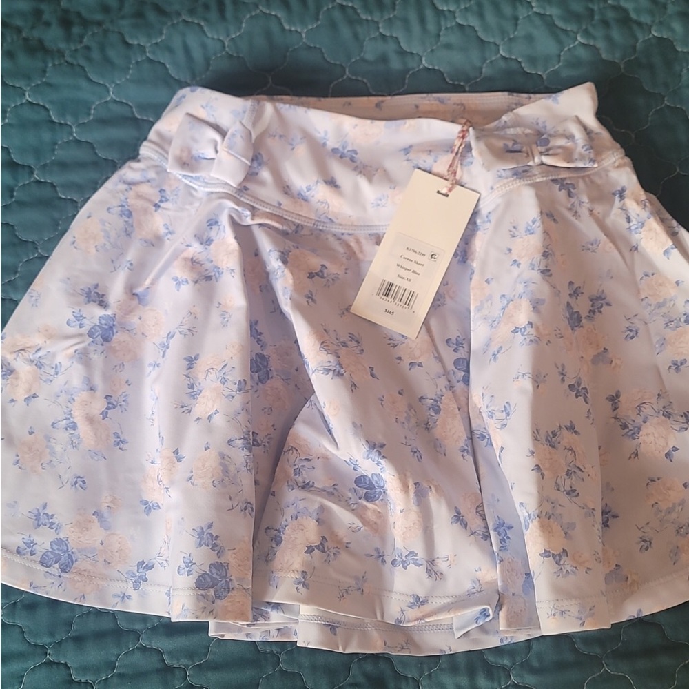 Authentic floral mini dress skort with side bow. Baby blue with blush pink acce